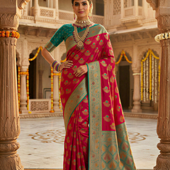 Vibrant Rani Pink Art Silk Banarasi Saree with Teal Green Contrast Border & Blouse Piece