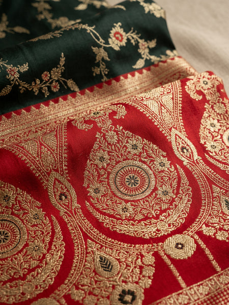 Majestic Bottle Green Banarasi Silk Saree with Crimson Red Contrast Border & Blouse Piece